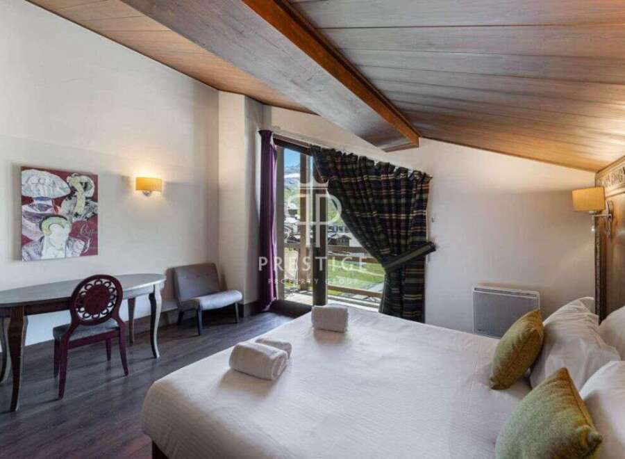 Discover a cozy bedroom with a touch of rustic charm.