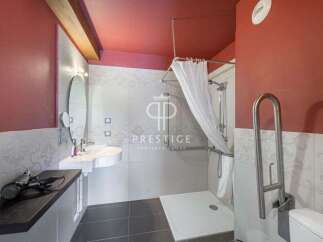 Discover a stylish bathroom with modern amenities.