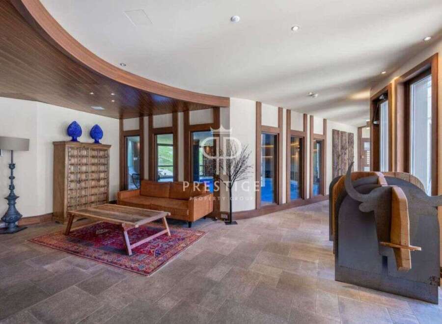 Discover luxury living at its finest! This stunning property boasts exquisite design with a touch of rustic charm.