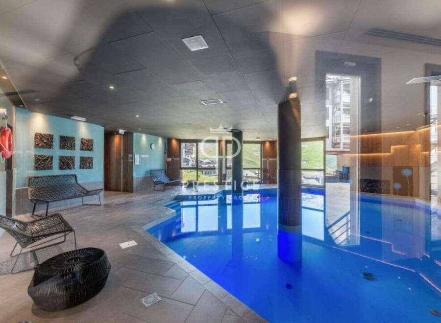 Indulge in luxury at this stunning property featuring a private indoor pool, perfect for year-round enjoyment.