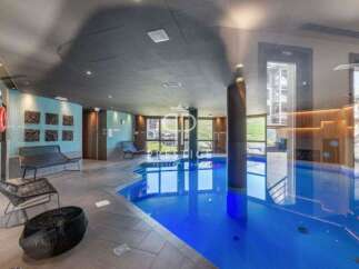 Indulge in luxury at this stunning property featuring a private indoor pool, perfect for year-round enjoyment.