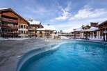 Discover a luxurious property with a stunning outdoor pool, perfect for relaxation.