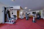 Step into your private fitness haven! This property boasts a fully equipped gym, perfect for maintaining your health and wellness.