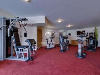 Step into your private fitness haven! This property boasts a fully equipped gym, perfect for maintaining your health and wellness.