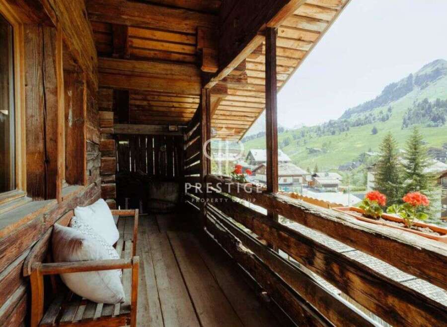 Experience the charm of this rustic property with a stunning mountain view.