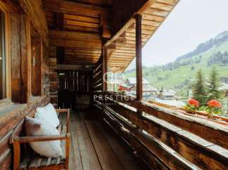 Experience the charm of this rustic property with a stunning mountain view.