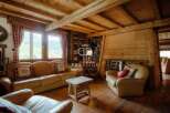 Experience rustic charm in this stunning property, featuring exposed wooden beams and a cozy fireplace.