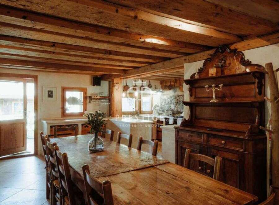 Experience rustic charm in this stunning property, featuring exposed wooden beams and a warm, inviting atmosphere.
