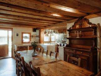 Experience rustic charm in this stunning property, featuring exposed wooden beams and a warm, inviting atmosphere.