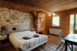 Discover rustic charm in this cozy bedroom.