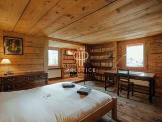 Experience rustic charm in this stunning property, featuring warm wooden interiors and a cozy ambiance.
