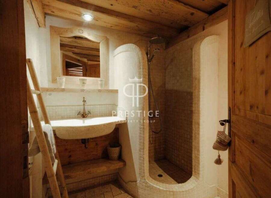 Discover rustic charm in this stunning bathroom.