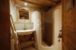Discover rustic charm in this stunning bathroom.