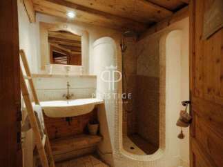 Discover rustic charm in this stunning bathroom.