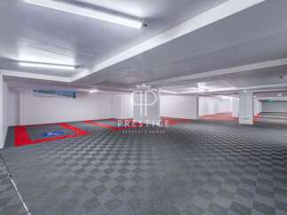 Discover this spacious parking garage, perfect for secure vehicle storage.