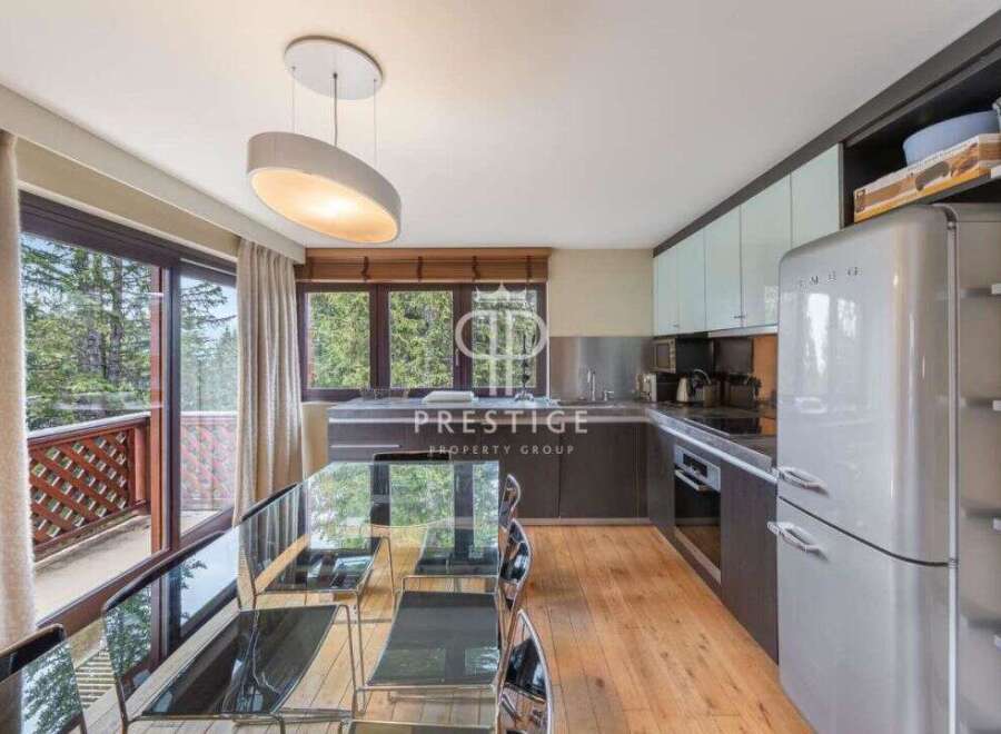 Discover a stunning kitchen with modern appliances and sleek design.