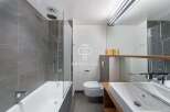 Discover modern luxury in this stunning bathroom.