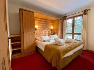 Discover a cozy bedroom with a touch of rustic charm.