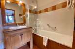 Discover a luxurious bathroom with a sleek design.