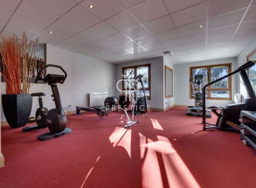 Discover the ultimate fitness retreat in this well-equipped gym.