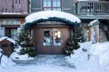 Discover a winter wonderland at this stunning property, perfectly nestled in a snowy landscape.