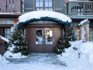 Discover a winter wonderland at this stunning property, perfectly nestled in a snowy landscape.
