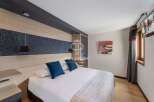 Discover a luxurious bedroom with a modern design.