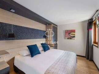 Discover a luxurious bedroom with a modern design.