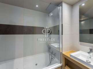Discover luxury living in this stunning property! Featuring a modern bathroom with a sleek design, this space offers both style and functionality.