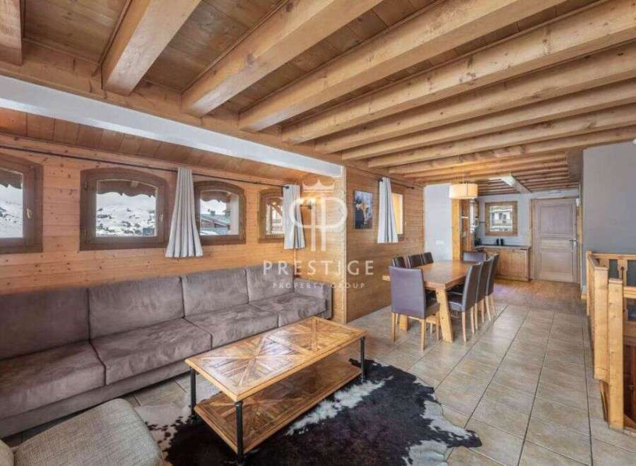 Discover the charm of this stunning property, featuring a cozy living area with a comfortable sofa and a unique coffee table.
