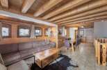 Discover the charm of this stunning property, featuring a cozy living area with a comfortable sofa and a unique coffee table.