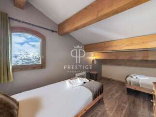 Discover a cozy bedroom with stunning mountain views.