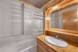 Discover the charm of this bathroom featuring a stylish vanity and a sleek sink.