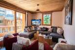 Discover the charm of this cozy living space, featuring a comfortable sectional sofa perfect for relaxation.