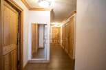 Discover the charm of this property, featuring elegant wooden doors and trim that exude warmth and sophistication.