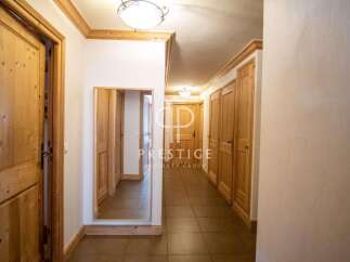 Discover the charm of this property, featuring elegant wooden doors and trim that exude warmth and sophistication.
