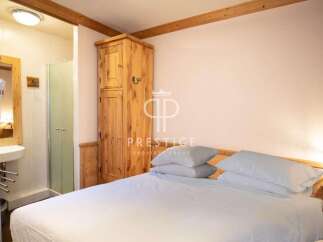 Discover a cozy bedroom with a touch of rustic charm.