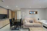 Discover a cozy living space with a modern touch.