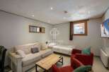 Cozy living space with a comfortable sofa and inviting armchairs.