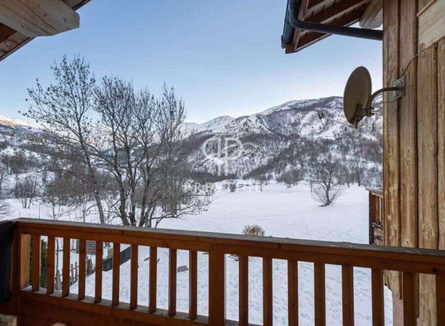 Enjoy breathtaking mountain views from this charming property.