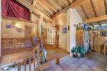 Discover the charm of this rustic property, featuring exposed wooden beams and a warm, inviting atmosphere.
