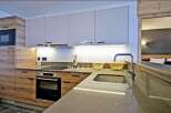 Discover modern luxury in this stunning kitchen.