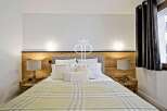 Discover the epitome of comfort in this exquisite bedroom.