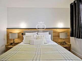 Discover the epitome of comfort in this exquisite bedroom.