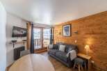 Cozy ski chalet living room with a modern touch.