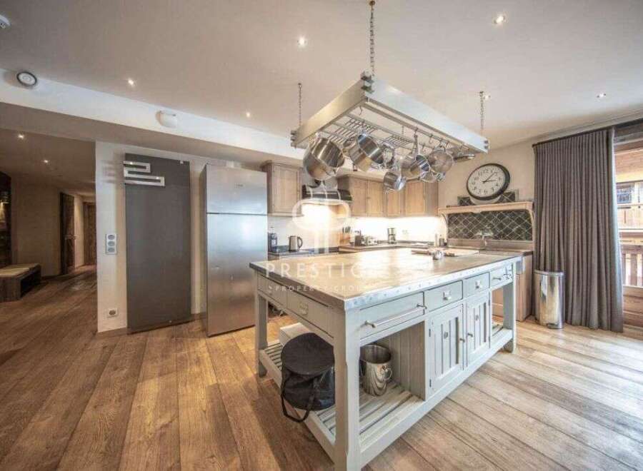 This stunning kitchen boasts a spacious island, perfect for culinary creations and entertaining.