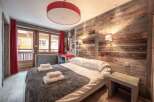 Experience rustic charm in this cozy bedroom.