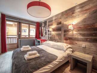 Experience rustic charm in this cozy bedroom.