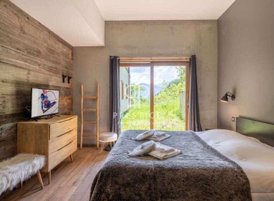 Experience the ultimate comfort in this cozy bedroom.
