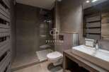 Discover luxury living in this stunning property! Featuring a modern bathroom with a sleek design, this space offers both style and functionality.